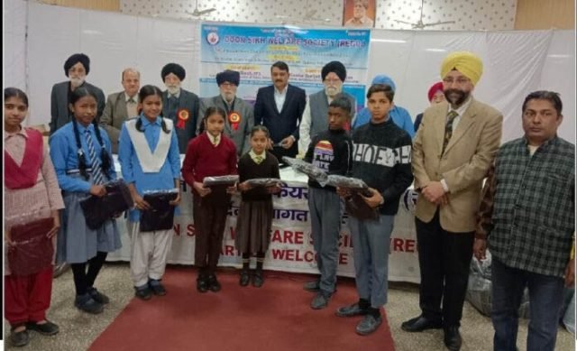 Doon Sikh Welfare Society distributed sweaters to 300 school children on the foundation day.