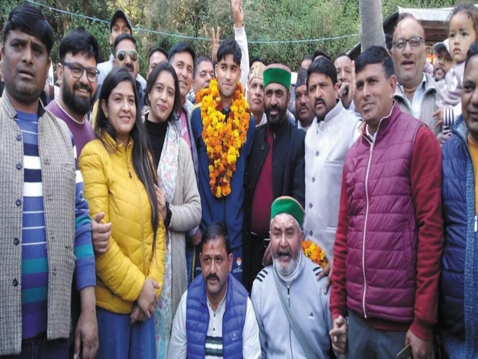 The member of the team that won the silver medal was given a warm welcome