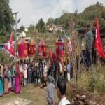 The deity reached the flag temple with a umbrella to give Bhitauli