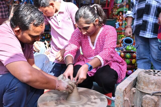 Little children learnt how to make clay pots, kites and other craft items at the Heritage Festival.