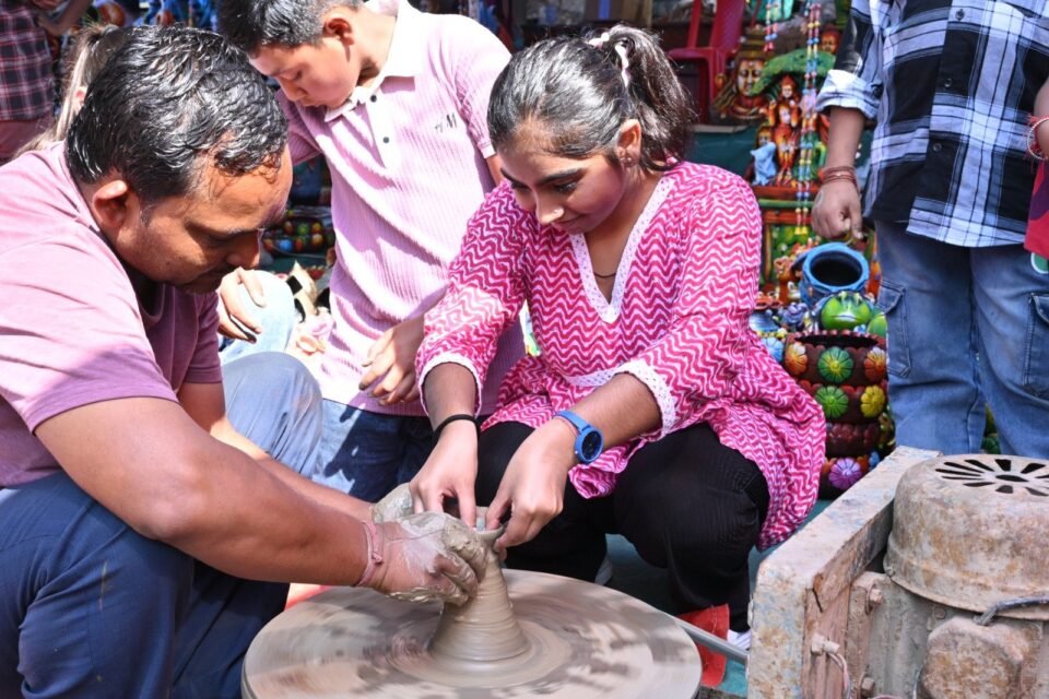 Little children learnt how to make clay pots, kites and other craft items at the Heritage Festival.
