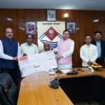 The Chief Minister gave cheques of Rs 50 lakh each to the dependents of the deceased UPNL employees.