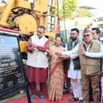 Cabinet Minister Ganesh Joshi laying the foundation stone of Rs 619 lakh drinking water scheme in Nayagaon Hathibarkala.