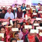Minister Ganesh Joshi distributed checks totaling ₹93 lakh in financial assistance to 74 disaster-affected families in Mussoorie.
