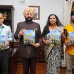 Regional Passport Officer Malvika Priyadarshini met the Governor and presented the magazine 'Naman'.